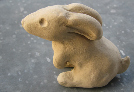 Clay rabbit lost in thought